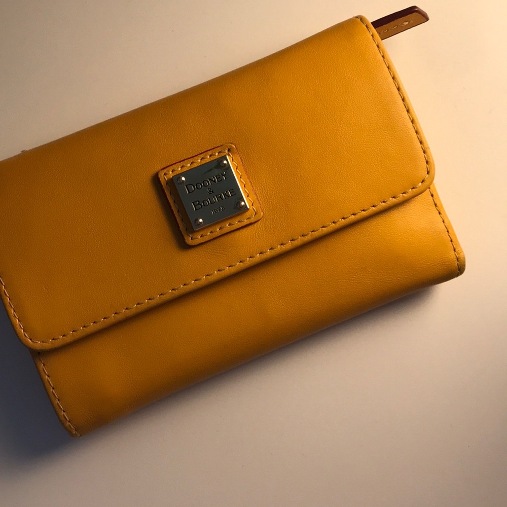 Brand New Dooney And Bourke Orange Wallet.